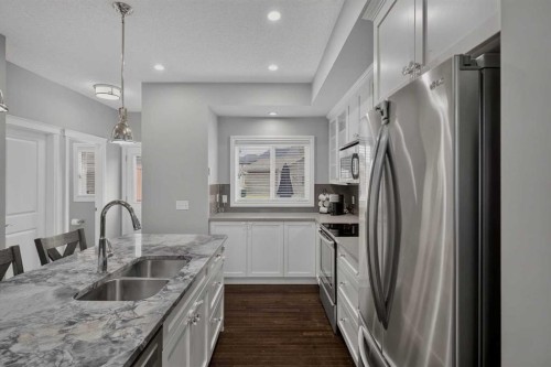 53 Mahogany Point Se, Calgary, AB - Indoor Photo Showing Kitchen With Stainless Steel Kitchen With Double Sink With Upgraded Kitchen