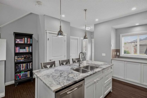 53 Mahogany Point Se, Calgary, AB - Indoor Photo Showing Kitchen With Double Sink With Upgraded Kitchen