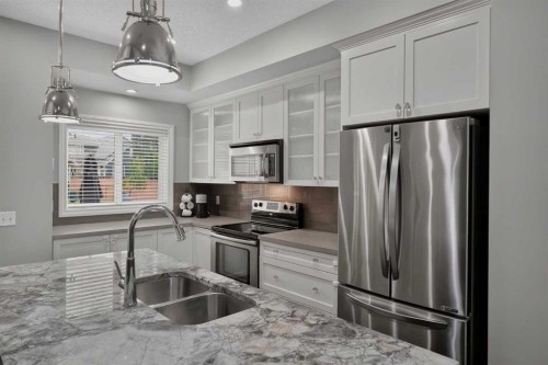 53 Mahogany Point Se, Calgary, AB - Indoor Photo Showing Kitchen With Stainless Steel Kitchen With Double Sink With Upgraded Kitchen