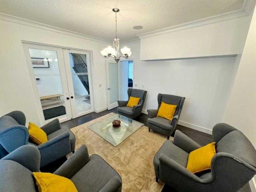 109 Kinniburgh Boulevard E Boulevard East, Chestermere, AB - Indoor Photo Showing Living Room