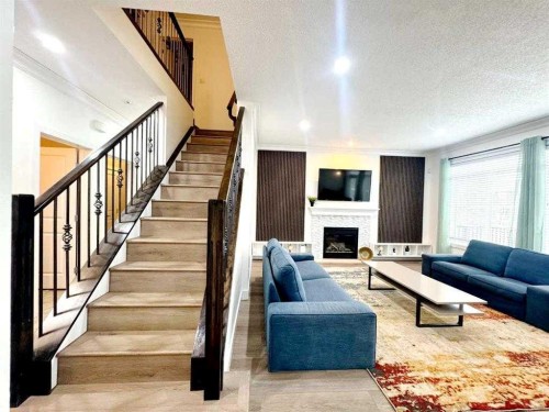 109 Kinniburgh Boulevard E Boulevard East, Chestermere, AB - Indoor With Fireplace