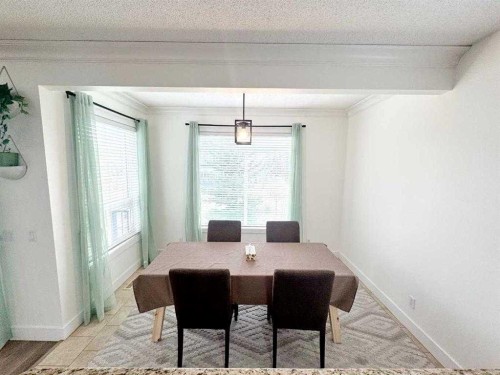 109 Kinniburgh Boulevard E Boulevard East, Chestermere, AB - Indoor Photo Showing Dining Room