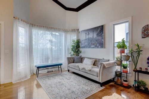 85 Sidon Crescent Sw, Calgary, AB - Indoor Photo Showing Living Room