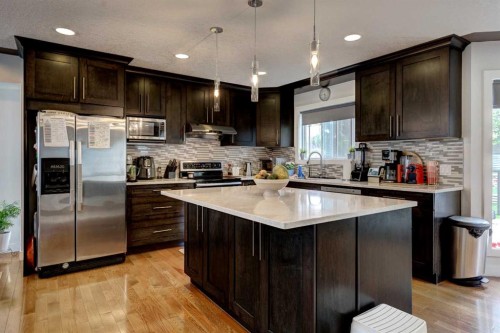 85 Sidon Crescent Sw, Calgary, AB - Indoor Photo Showing Kitchen With Stainless Steel Kitchen With Upgraded Kitchen