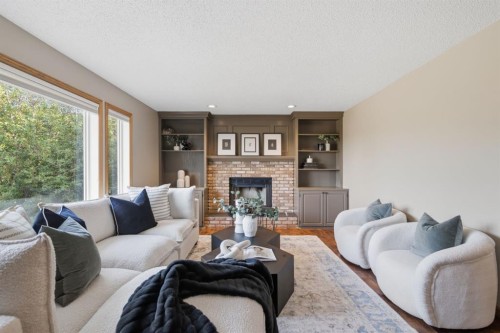 473 Hawkford Way Nw, Calgary, AB - Indoor Photo Showing Living Room With Fireplace
