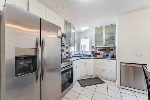 44 Templehill Drive Ne, Calgary, AB - Indoor Photo Showing Kitchen With Stainless Steel Kitchen