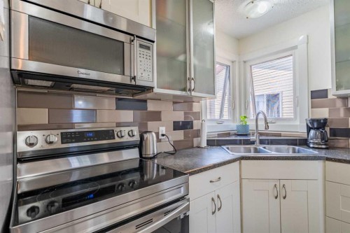 44 Templehill Drive Ne, Calgary, AB - Indoor Photo Showing Kitchen With Stainless Steel Kitchen With Double Sink