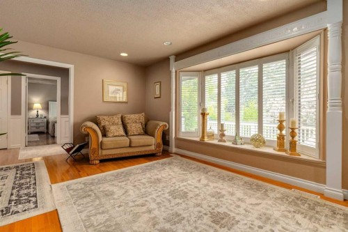 783 Lake Twintree Crescent Se, Calgary, AB - Indoor Photo Showing Living Room