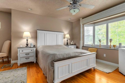 783 Lake Twintree Crescent Se, Calgary, AB - Indoor Photo Showing Bedroom