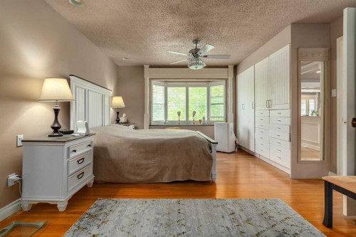 783 Lake Twintree Crescent Se, Calgary, AB - Indoor Photo Showing Bedroom