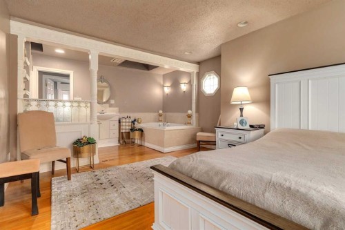 783 Lake Twintree Crescent Se, Calgary, AB - Indoor Photo Showing Bedroom