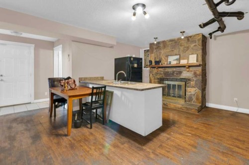 127 Scenic Cove Circle Nw, Calgary, AB - Indoor With Fireplace
