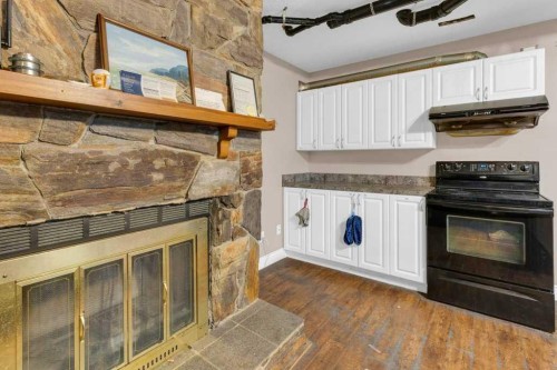 127 Scenic Cove Circle Nw, Calgary, AB - Indoor With Fireplace