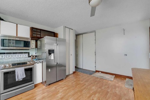 104 Falsby Way Ne, Calgary, AB - Indoor Photo Showing Kitchen With Stainless Steel Kitchen