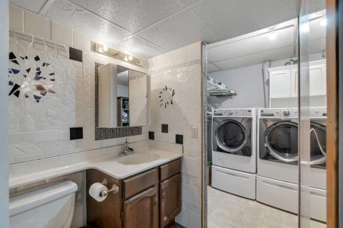 104 Falsby Way Ne, Calgary, AB - Indoor Photo Showing Laundry Room