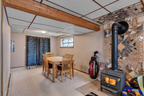 104 Falsby Way Ne, Calgary, AB - Indoor With Fireplace