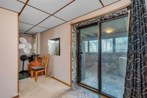 104 Falsby Way Ne, Calgary, AB - Indoor Photo Showing Other Room