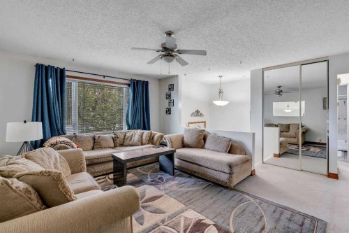 104 Falsby Way Ne, Calgary, AB - Indoor Photo Showing Living Room