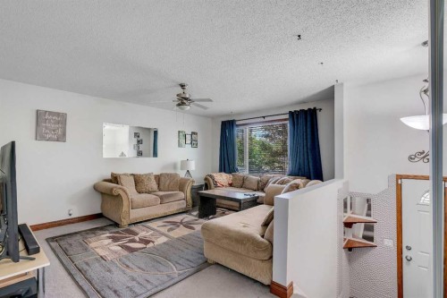 104 Falsby Way Ne, Calgary, AB - Indoor Photo Showing Living Room