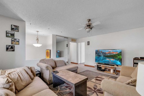 104 Falsby Way Ne, Calgary, AB - Indoor Photo Showing Living Room