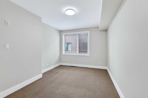 10-1717 27 Avenue Sw, Calgary, AB - Indoor Photo Showing Other Room