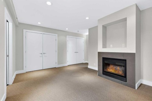 10-1717 27 Avenue Sw, Calgary, AB - Indoor With Fireplace