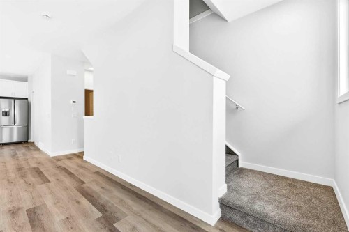 302-40 Creekside Way Sw, Calgary, AB - Indoor Photo Showing Other Room