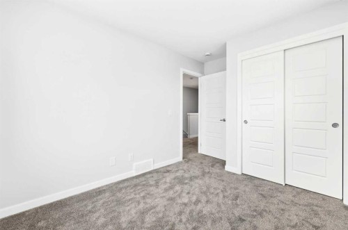 302-40 Creekside Way Sw, Calgary, AB - Indoor Photo Showing Other Room
