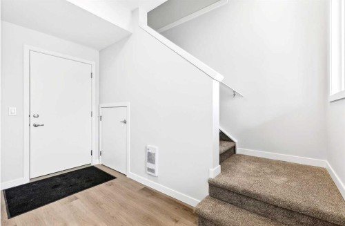 302-40 Creekside Way Sw, Calgary, AB - Indoor Photo Showing Other Room