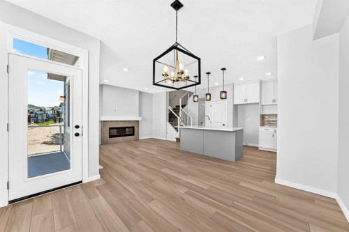 135 Mallard Heath Se, Calgary, AB - Indoor With Fireplace