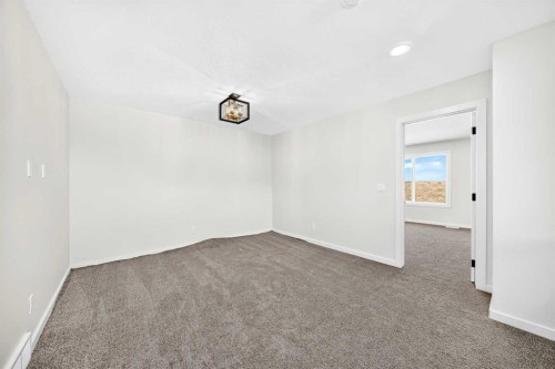 135 Mallard Heath Se, Calgary, AB - Indoor Photo Showing Other Room
