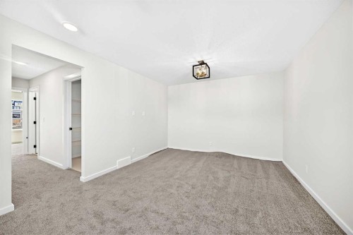 135 Mallard Heath Se, Calgary, AB - Indoor Photo Showing Other Room