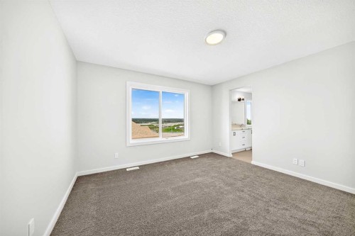 135 Mallard Heath Se, Calgary, AB - Indoor Photo Showing Other Room