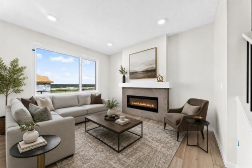 135 Mallard Heath Se, Calgary, AB - Indoor Photo Showing Living Room With Fireplace