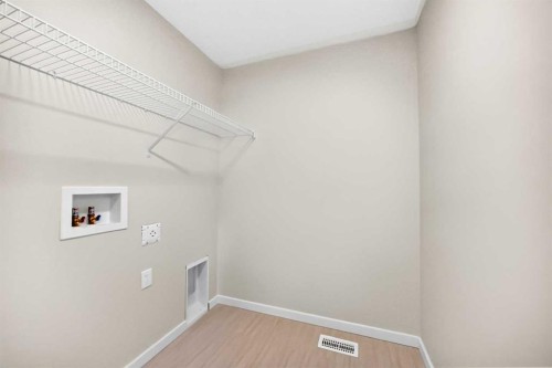 135 Mallard Heath Se, Calgary, AB - Indoor With Storage