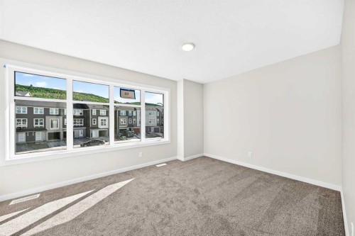 135 Mallard Heath Se, Calgary, AB - Indoor Photo Showing Other Room