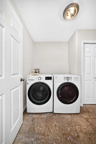 531 Stonegate Road Nw, Airdrie, AB - Indoor Photo Showing Laundry Room