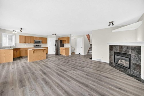 531 Stonegate Road Nw, Airdrie, AB - Indoor With Fireplace