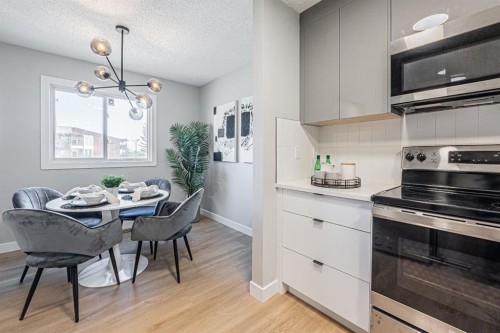 602-919 38 Street Ne, Calgary, AB - Indoor Photo Showing Dining Room