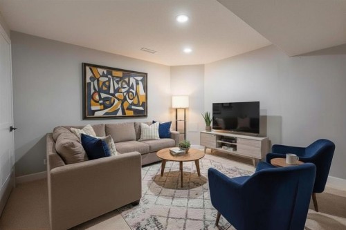 602-919 38 Street Ne, Calgary, AB - Indoor Photo Showing Living Room