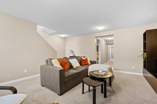 38 Auburn Bay Gardens Se, Calgary, AB - Indoor Photo Showing Living Room