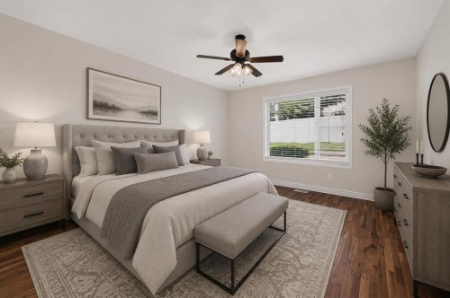 21 Strathearn Gardens Sw, Calgary, AB - Indoor Photo Showing Bedroom