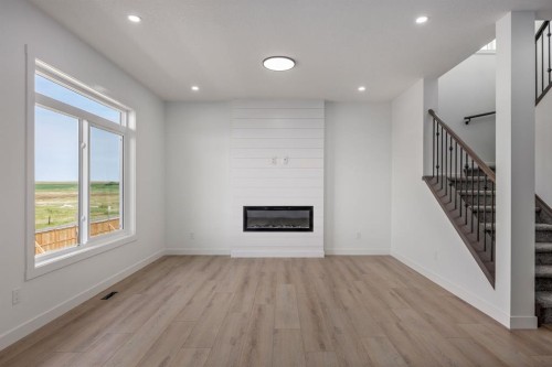 140 Lakewood Crescent, Strathmore, AB - Indoor With Fireplace