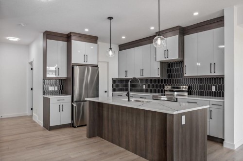 140 Lakewood Crescent, Strathmore, AB - Indoor Photo Showing Kitchen With Stainless Steel Kitchen With Upgraded Kitchen