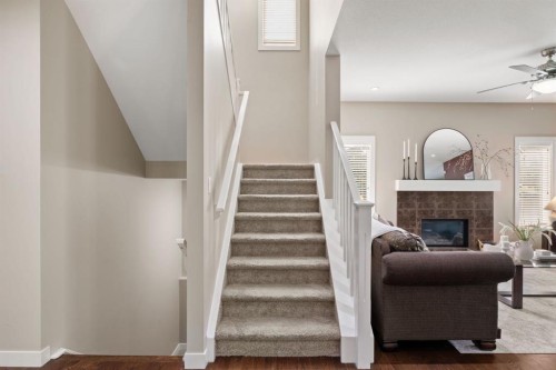 25 Masters Park Se, Calgary, AB - Indoor With Fireplace