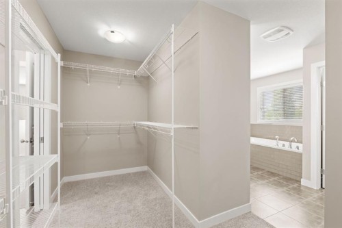 25 Masters Park Se, Calgary, AB - Indoor With Storage
