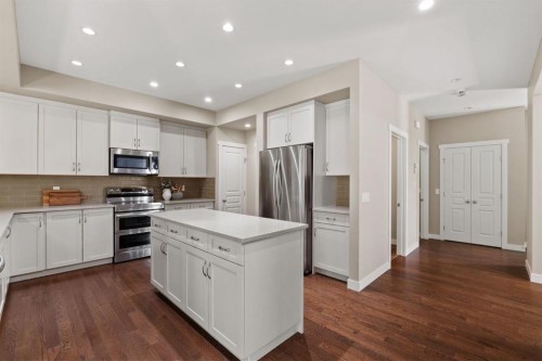 25 Masters Park Se, Calgary, AB - Indoor Photo Showing Kitchen With Stainless Steel Kitchen