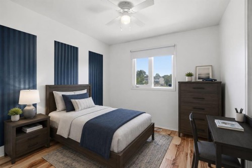 7807 Olympia Bay Se, Calgary, AB - Indoor Photo Showing Bedroom