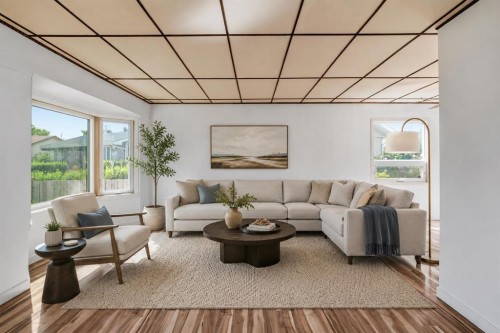 7807 Olympia Bay Se, Calgary, AB - Indoor Photo Showing Living Room
