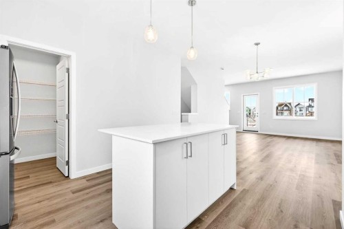 301-40 Creekside Way Sw, Calgary, AB - Indoor Photo Showing Kitchen